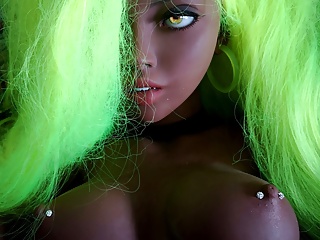 Ebony Skinned Sex Doll Masturbates With A Joypad free video