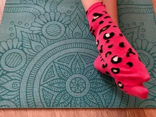 Gloria Gimson In Pink Socks Caresses Her Feet On A Yoga Mat free video